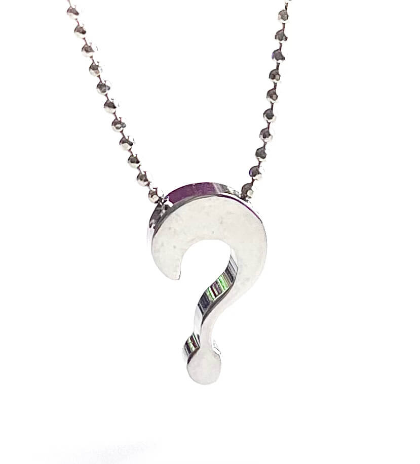Silver question mark charm on a silver ball chain and white background