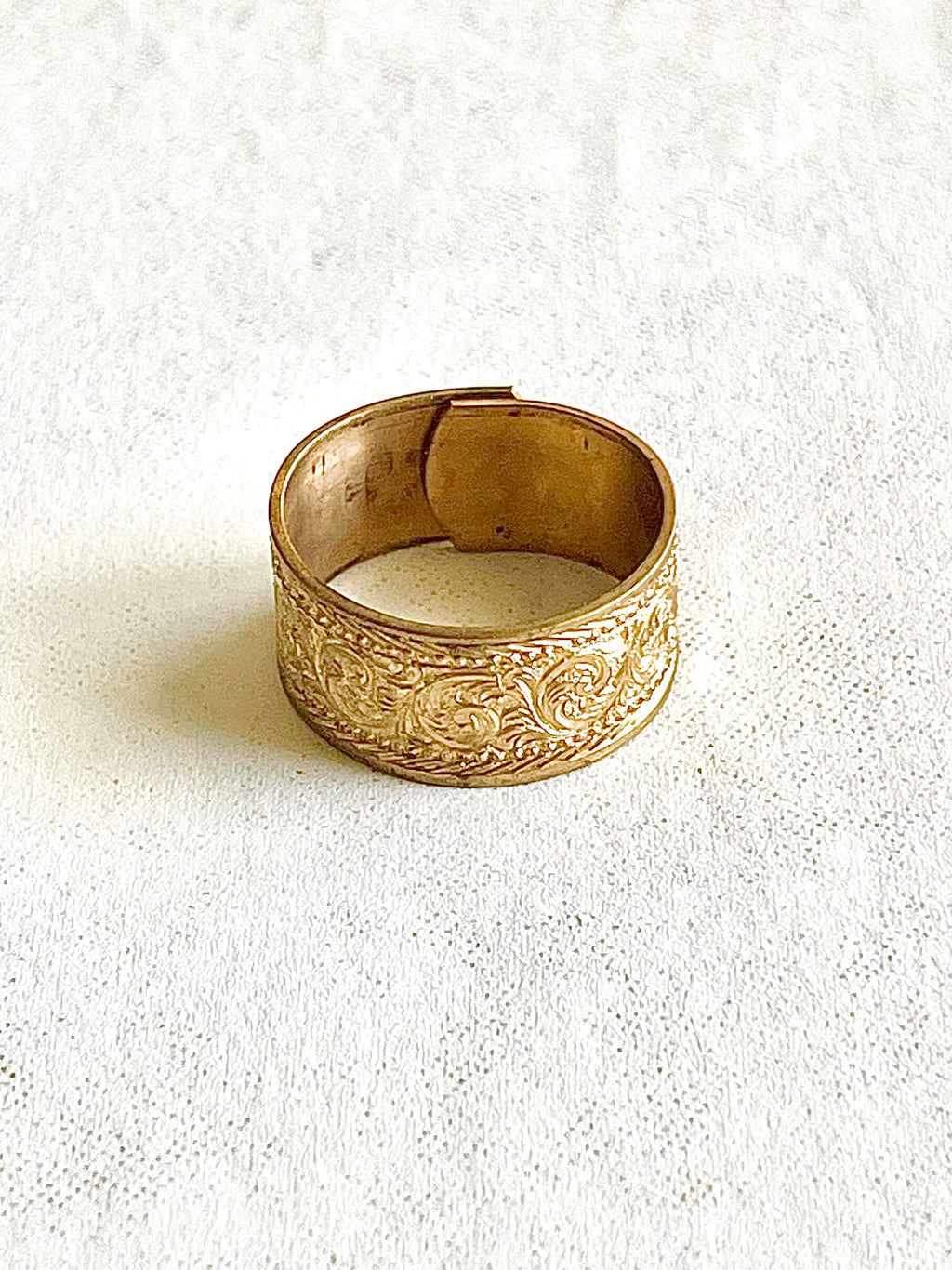 Yellow brass adjustable ring with ornate design