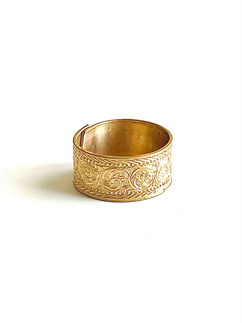 Yellow brass adjustable ring with ornate design