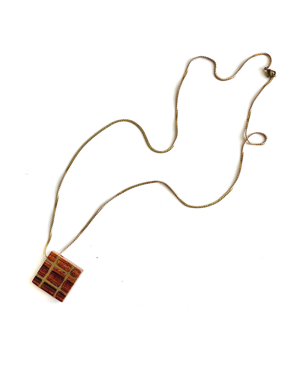 Necklace with a square pendant on a white background